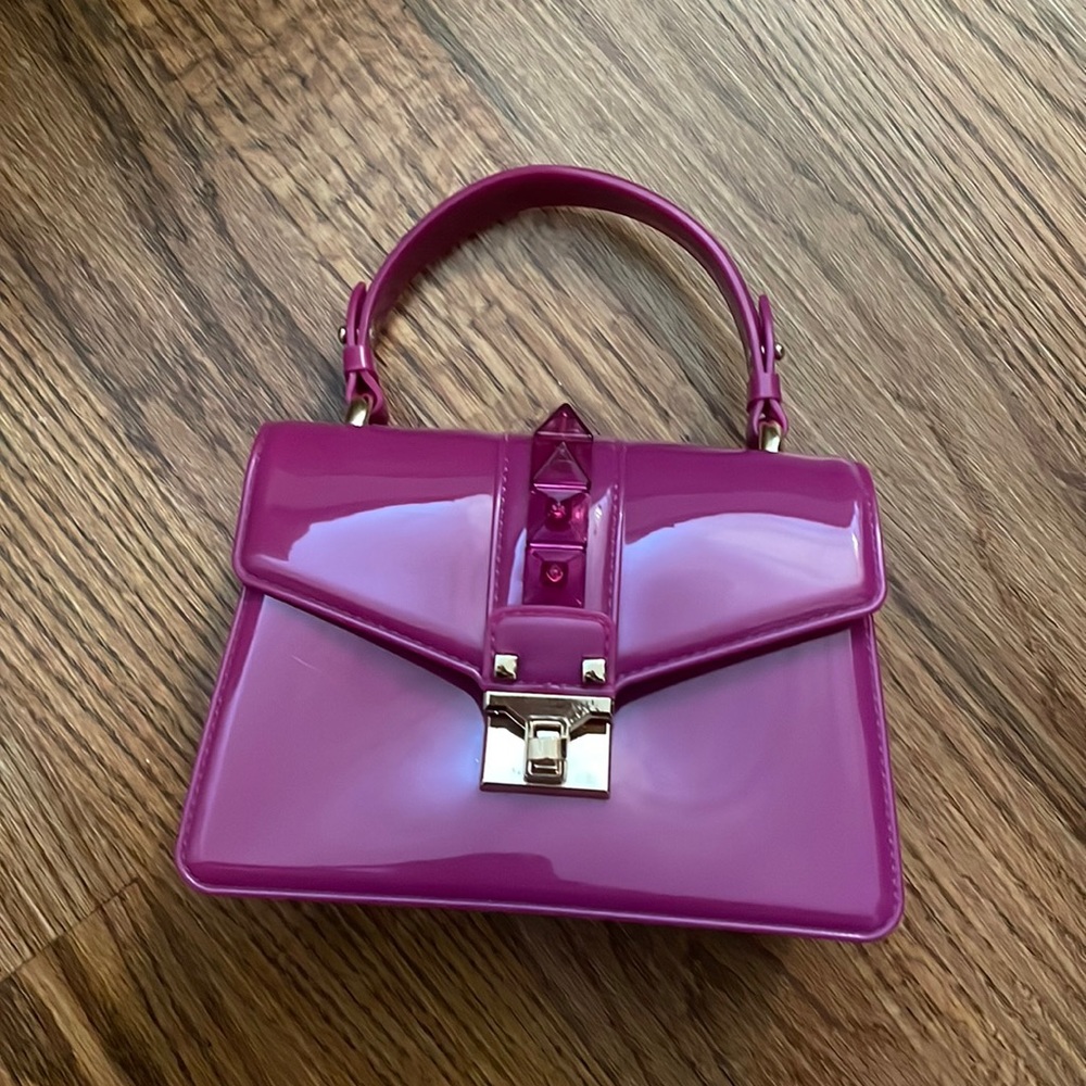 magenta studded purse